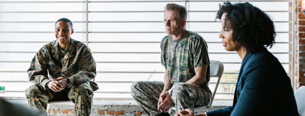 Military veterans during therapy which addresses the problems of PTSD and alcohol abuse