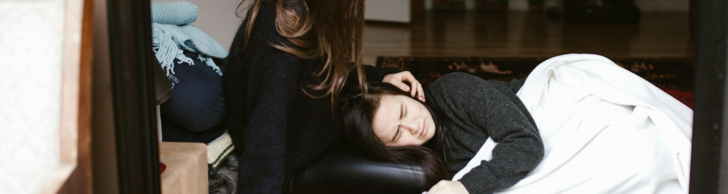 A woman comforting a man illustrating emotional support provided at home. 