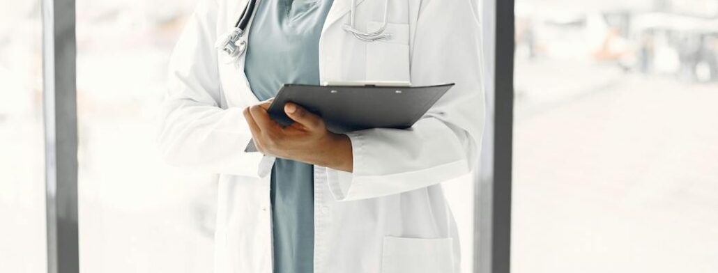 A doctor holding a notepad